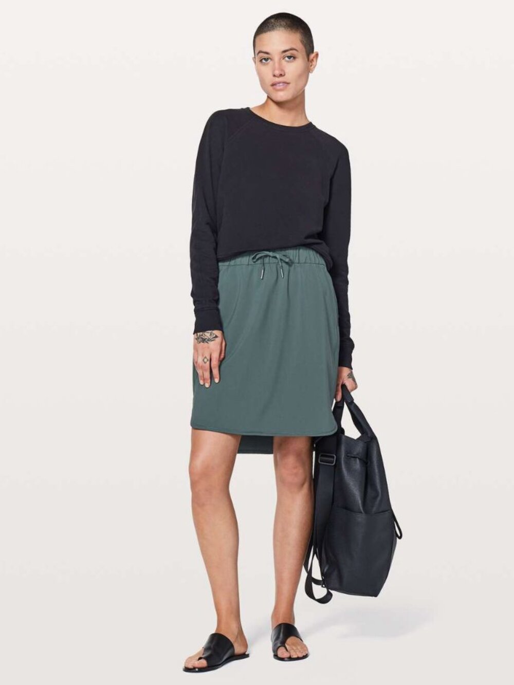 LULULEMON On the Fly woven skirt Sizse 6 EUC dark greenish